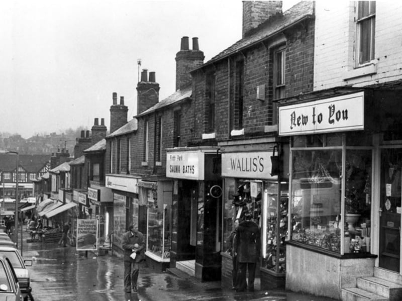 Shops on Bellhouse Road, Sheffield, looking towards Firth Park roundabout, in November 1980, including New to You, secondhand shop; Wallis's, boot and shoe makers; and Firth Park, Sauna Baths