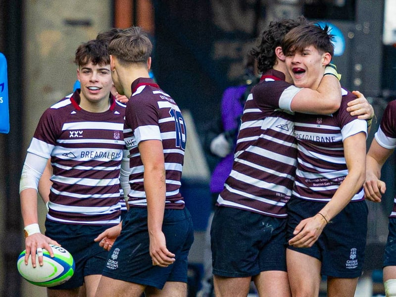 George Watson's players celebrate a try during the Under-16 final at Murrayfield.