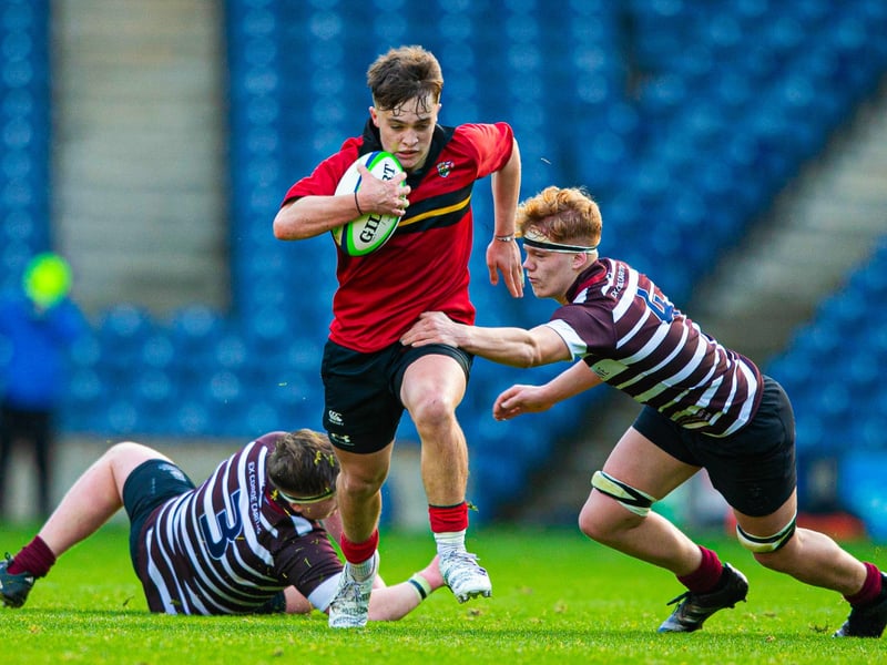 Match action between Stewart's Melville (red) and George Watson's during the Under-16 Schools Cup final at Murrayfield.