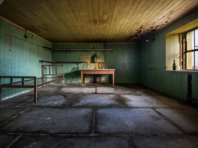 The stone floor and wooden walls of this farmhouse speak to tradition but the remains of the single bed hint at times past at Atlanduin.