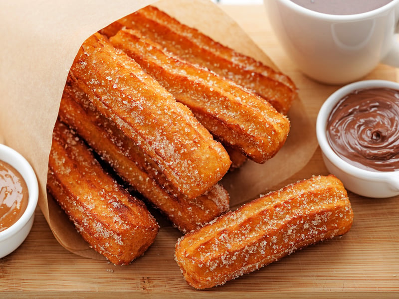 If I’m in the mood for something sweet, churros is my ultimate choice. Oozing with rich chocolate packed in a sugary dough, it’s an absolute treat.