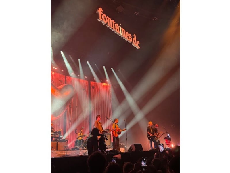 The set was topped by the band's name in lights.