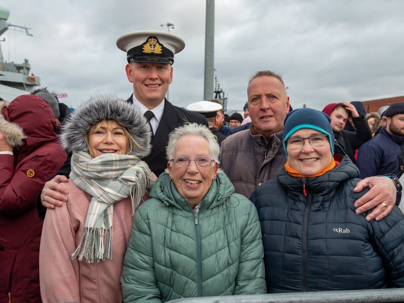 Sub-Lieutenant Morgan O'Neill (29) reunited with his family at HMNB Portsmouth.