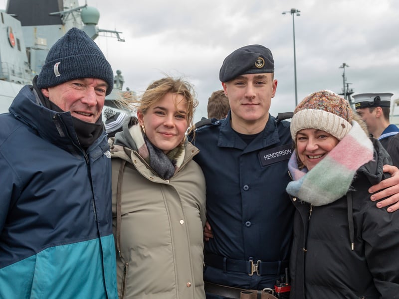 Charlie Henderson (18) - the youngest member of the HMS Duncan crew - with family at HMNB Portsmouth.