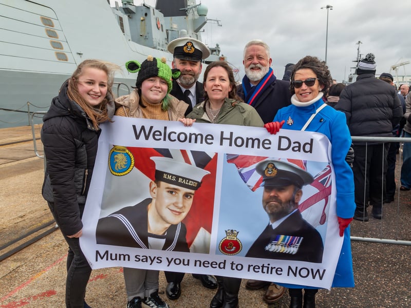 Warrant Officer Daz Hemmings (54) reunited with his family at HMNB Portsmouth.
