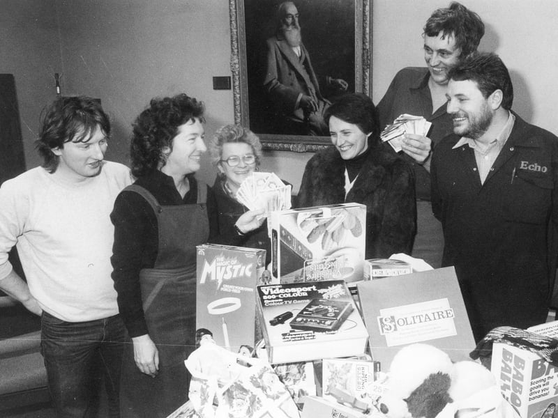 Wearmouth miners' wives Jan Ellison and Carol Bradley (centre) are pictured receiving gifts of toys, food hampers, and money from Sunderland Echo staff (left to right): Frank Nicholson, Carol Roberton, Clive Collinson and Alan Bell