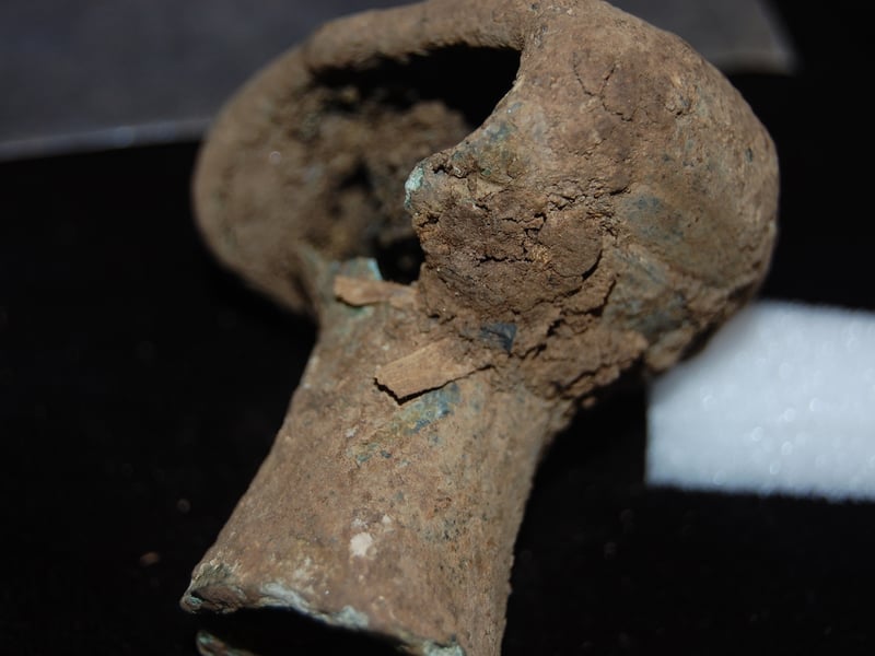 A bronze Pictish spearbutt found at East Lomond Hillfort near Falkland in Fife which is likely to have been used in close contact. 