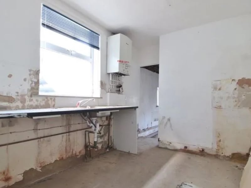 The listing says: "Stonebridge Shaw is pleased to bring to market this three-bedroom property which offers an exciting renovation project for the right person."