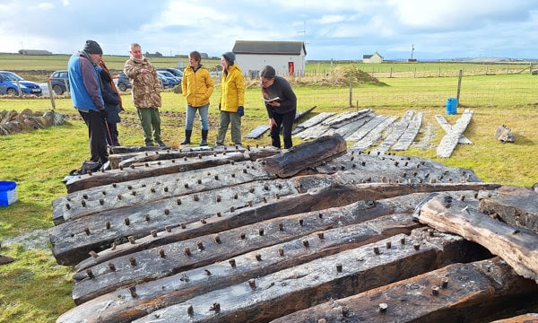 Timbers from the 17th Century shipwreck which was exposed in the sands of Sanday, Orkney. The ship is likely to have been either English or Dutch.