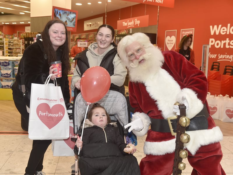 Pictured is: (l-r) Jasmine Stanley, Cherish Marsh and Ruby Clasby (2) with Father Christmas. Picture: Sarah Standing (121224-7661)