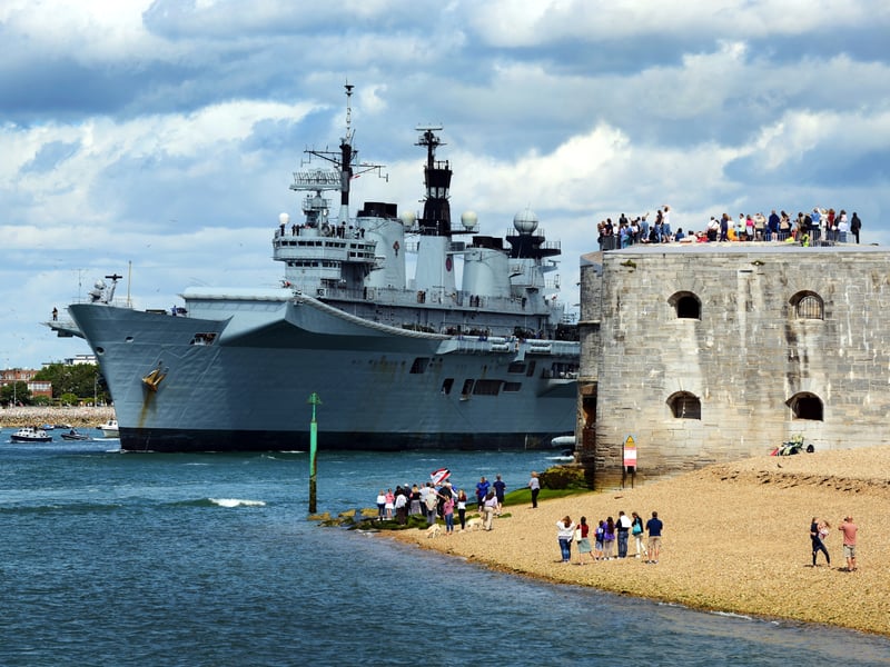 HMS Illustrious served as the Royal Navy flagship between 2007 and 2009. She's pictured leaving Portsmouth to carry out an exercise in the Mediterranean.