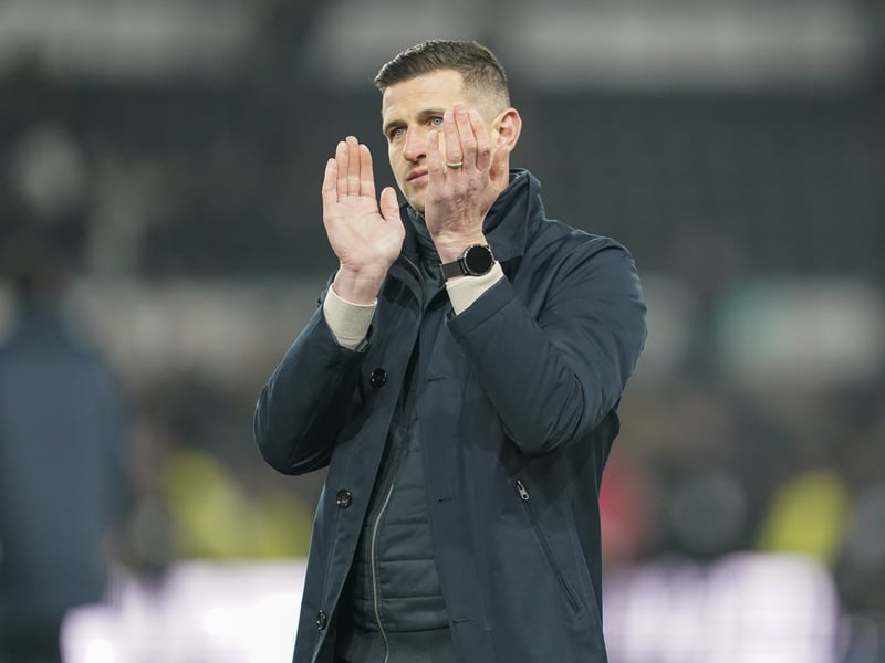 Pompey boss John Mousinho salutes the travelling fans after the 4-0 Derby County battering.