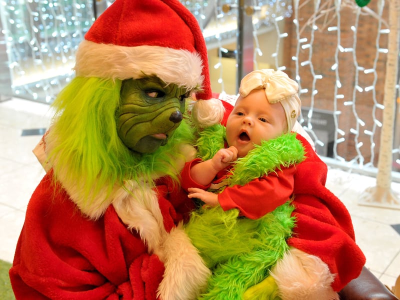Two-month-old Minnie McCulloch from Middleton says hello to the Christmas Grouch.