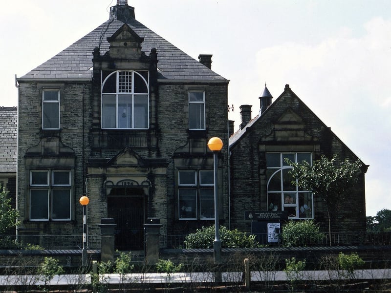 The main entrance to Blackgates Infant School on Bradford Road in August 1971. It is a board school dating from 1894, just before the formation of Ardsley Urban District Council. The room with an arched window above the entrance was used as a Board Room for Council meetings until 1937 when Ardsley joined Morley Borough. Recently a new primary P.F.I. school has been built on the site of the old junior school in Smithy Lane for children aged between three and 11.