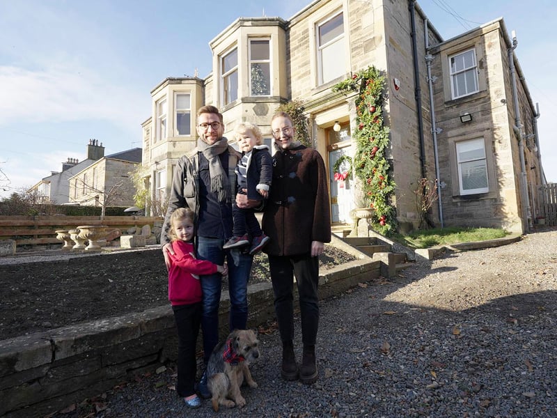 Homeowners Gordon and Kirsty with their children Rae and Freddie outside Holly Bank House, Dalkeith