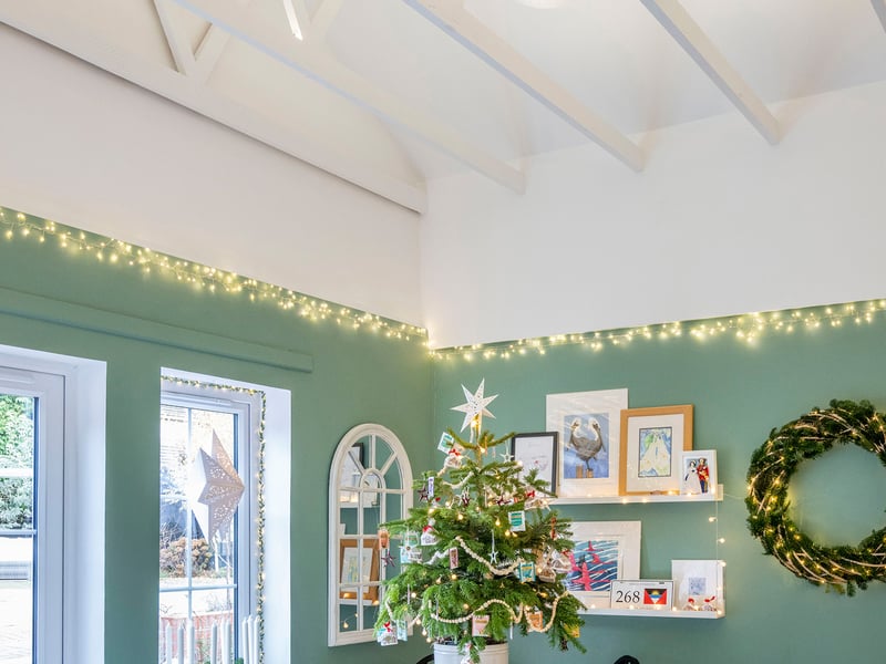 Scotland's Christmas Home of the Year, Santa's Snug, Alloa. Ann and Rolf reconfigured the original layout of Santa's Snug to create more open-plan living which includes a kitchen with a vaulted ceiling - perfect for their giant floating Christmas baubles