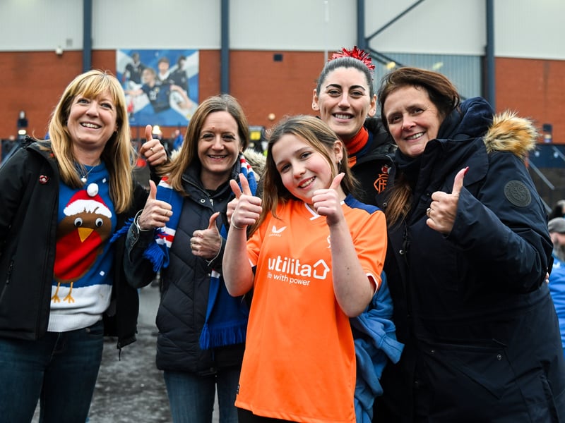 A family of Rangers fans get ready to enter Hampden Park.