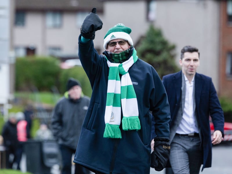 A Celtic fan gives the camera the thumbs up ahead of the game at Hampden.