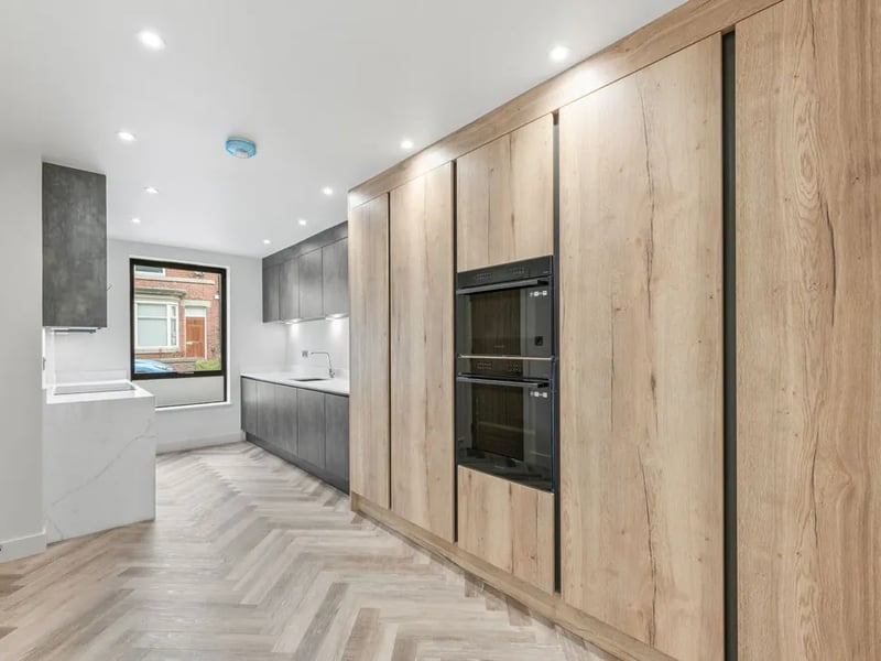 Other features include this hi-spec fitted kitchen, solar panels, fibre broadband in every room and roof terraces.