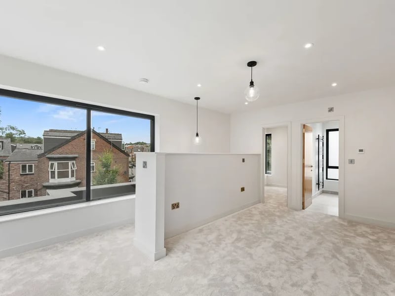 The interior is modern and cosy, flush with sweeping windows, under floor heating throughout, and fabulous views.