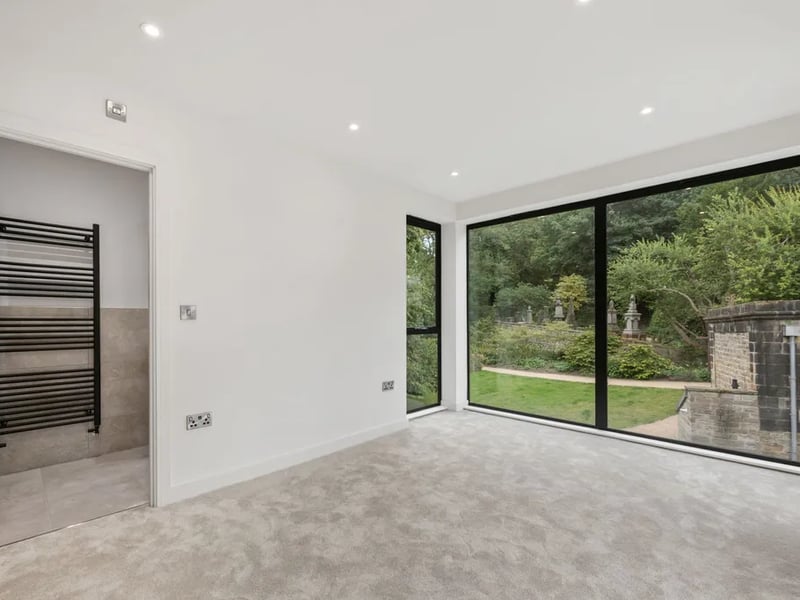 This compact four bedroom property has four bathrooms to go with it.