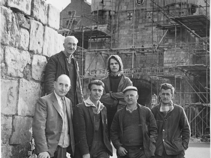 The team of York Corporation stonemasons whose main task in October 1969 was to preserve the city's bar walls and gateways. Pictured, front from left, are Walter Slater, Peter Green, Neville Coobs, and Lawrence Martin. Back, from left, are Jim Hearld and Alan Curtis. 