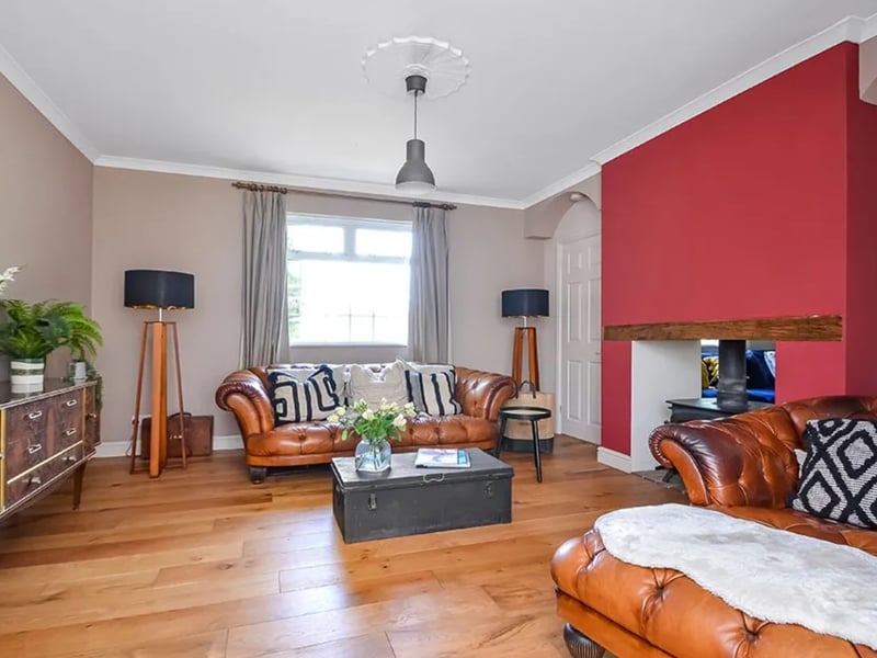 The listing says: "An individual and spacious family home set on a quiet lane on Hayling Island. With about 2816 sq.ft. Of accommodation, there is a large garden, outbuildings and a good degree of privacy. There is open land to both the front and rear of the property."