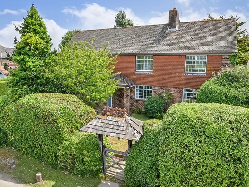 The listing says: "Tucked behind high hedging on a large plot, Northfork benefits from a good degree of privacy and is situated on a quiet lane."