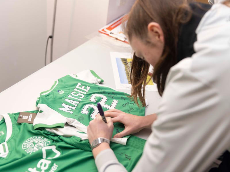Players from both the men's and women's teams spent time signing autographs and dishing out presents.