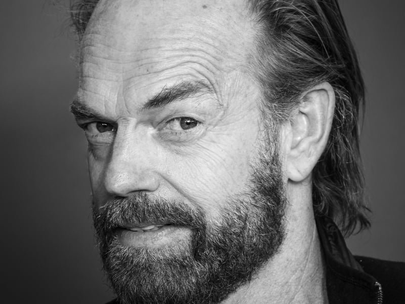 British-Australian actor Hugo Wallace Weaving was born in Ibadan, British Nigeria to British parents in 1960. His family moved back to the UK a year after Hugo was born. They lived in Bedford and Brighton before moving to Melbourne and Sydney in Australia; Johannesburg in South Africa; and then returning to the UK again. Whilst in the UK, Hugo studied at The Downs School, Wraxall, near Bristol, and Queen Elizabeth's Hospital.