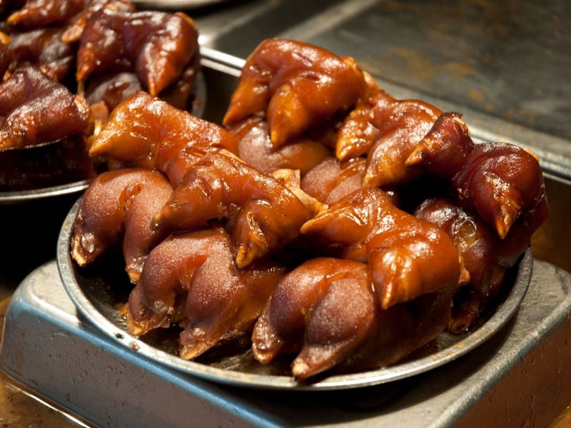 Italians also enjoy a feast that often includes 'zampone' (stuffed pig’s trotter) and 'cotechino' (spiced sausage) with lentils, symbolizing wealth and prosperity. Fireworks light up the skies as communities gather in piazzas to celebrate 'La Festa di San Silvestro'.