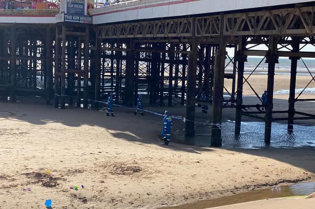 Central Pier was evacuated and closed after a woman fell through a ‘trap door’ in the boards to the beach below.
Visitors to Central Pier were evacuated as emergency services tried to help the woman. The Terrace bar remained open and music could be heard from the Promenade.