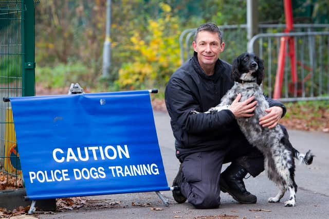 Police dog support unit instructor, Paul Sainsbury, with police dog Ossie