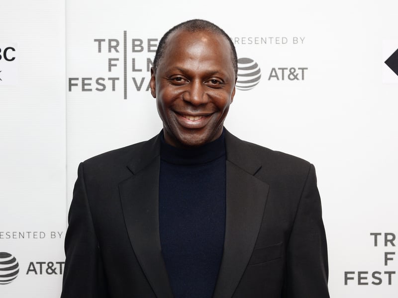 Cyril is best known for playing Superintendent Adam Okaro on The Bill – the highest ranking Black officer in the history of the long-running police procedural series – and Lord Danbury on Netflix’s Queen Charlotte: A Bridgerton Story. He trained at Bristol Old Vic Theatre School from 1986 to 1989.