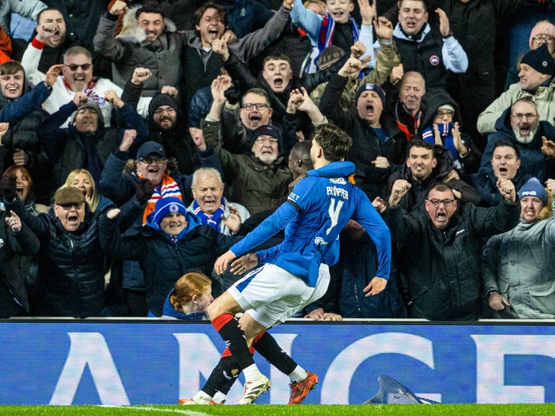 Robin Propper celebrates his goal with the Rangers fans.