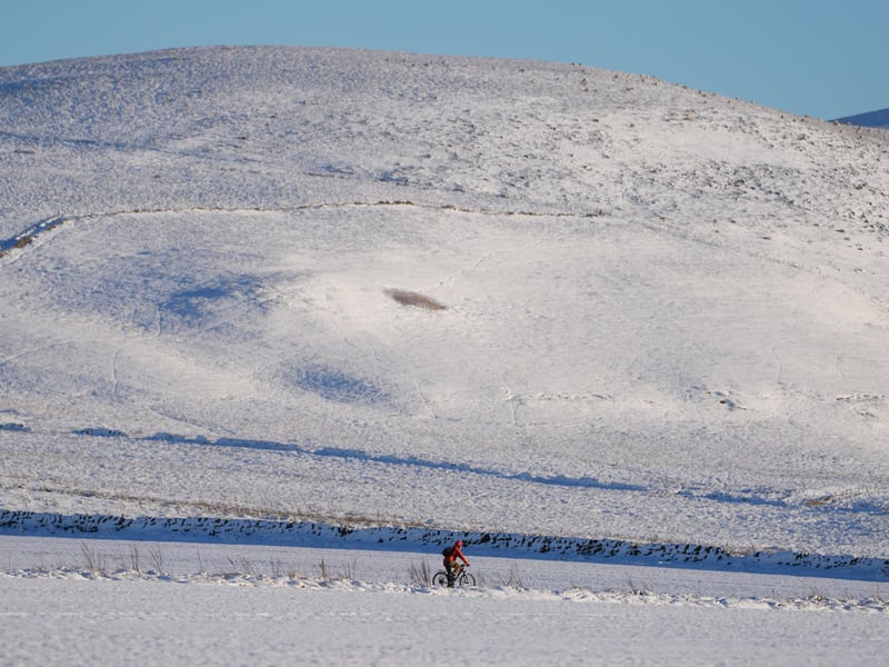 A cyclist takes a scenic route through the Pentland Hills on Friday morning.