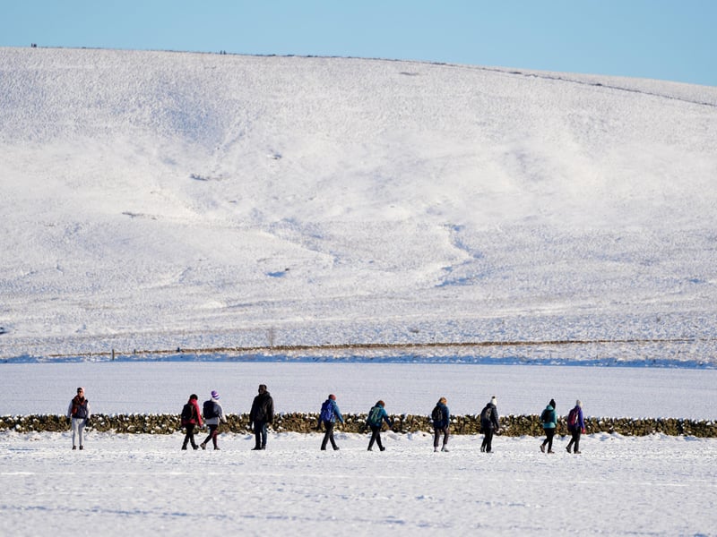 The Pentland Hills in the snow provide a beautiful backdrop.
