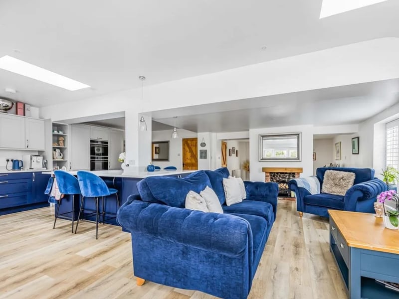 The listing says: "Nestled in the picturesque countryside of Denvilles, just north of Emsworth, this delightful four-bedroom flint cottage offers an exceptional semi-rural living experience." 