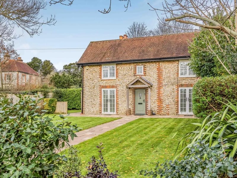 This home comes with four bedrooms, two bathrooms and three reception rooms. 