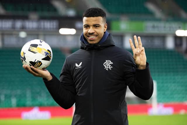 Rangers striker Hamza Igamane with the match ball after scoring a perfect hat-trick in the 3-3 draw with Hibs on Sunday. (Photo by Ross Parker / SNS Group)