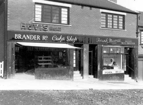 Brander Road Cake shop and the premises of Mrs L. Rudge. Next door at 61 is Frank Morritt, Butchers. Pictured in March 1937.