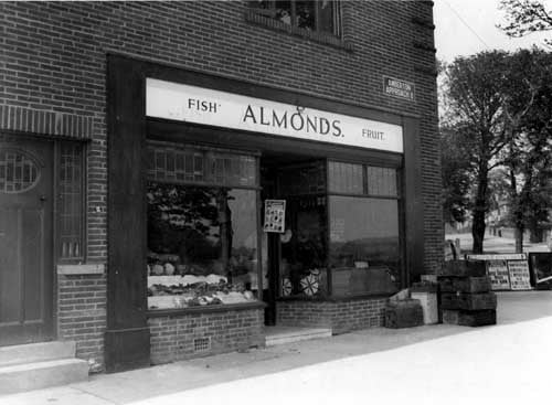 Amberton Approach in May 1937. At the junction with Oak Tree Drive, Oakwood Lane and Amberton Approach. Number 2 Greengrocer and Fishmonger business Almond brothers were the owners.