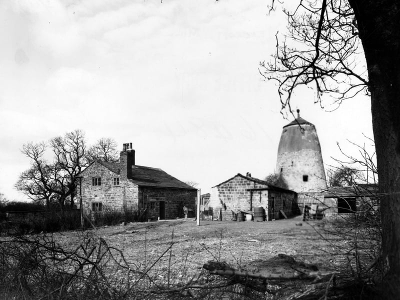 The old Windmill and farm buildings at Seacroft, seen from the south. Pictured in March 1949.