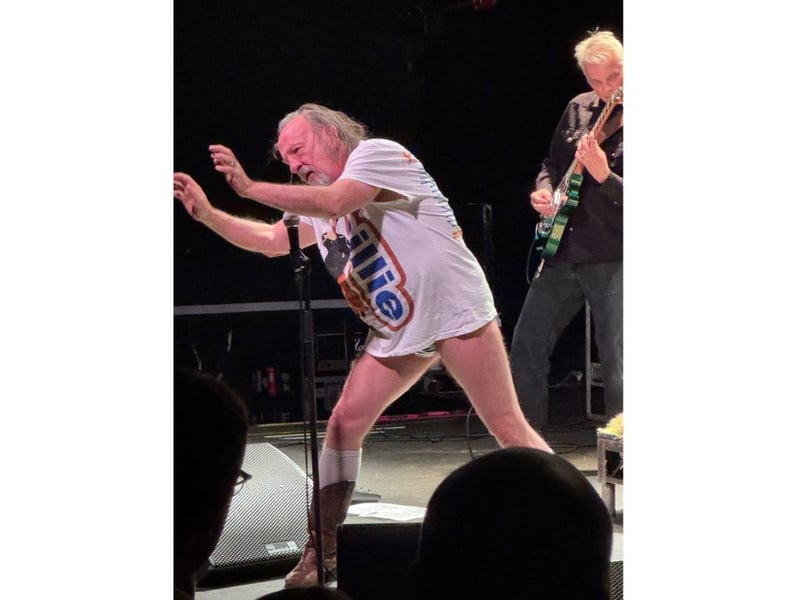 Yow then stripped to reveal a Billie Eilish tour tshirt.