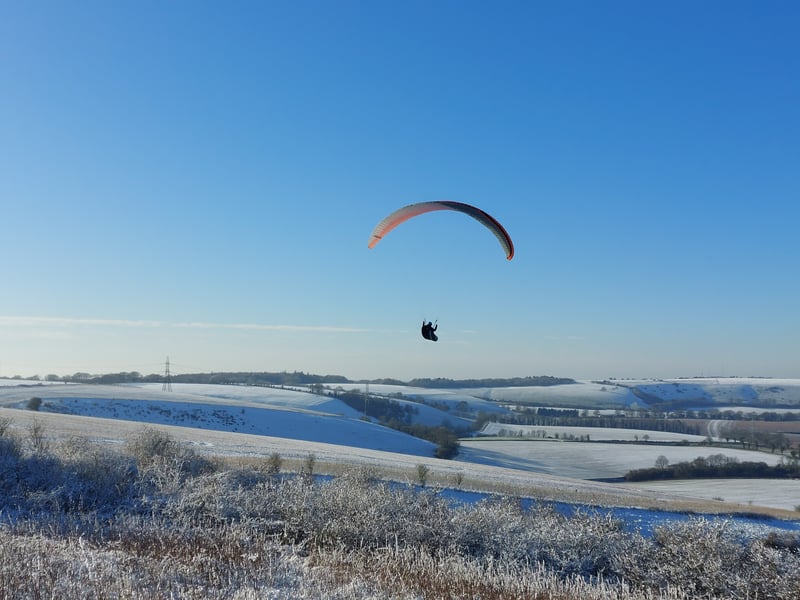 A paraglider gets a birds eye view of the wintry conditions