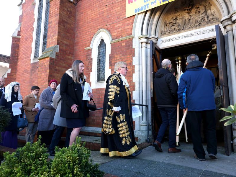 The procession returning to the church for Benediction and then Mass