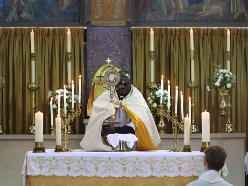 Father Emmaunel during the services to celebrate the church's re-opening