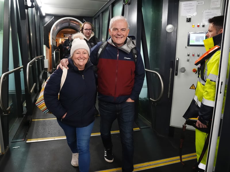 Passengers depart the Glen Sannox ferry as it journeys from Troon to Brodick on Isle of Arran on its first official day in service. Originally due for delivery in 2018, the ferry and sister ship Glen Rosa have endured a saga of costly delays and technical problems at shipyard Ferguson Marine