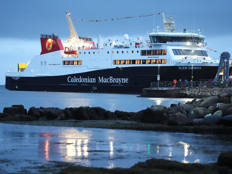 The Glen Sannox ferry journeys from Brodick on Isle of Arran to Troon on its first official day in service. The ferry, built at the Ferguson Marine shipyard in Port Glasgow, was initially due to be delivered in 2018