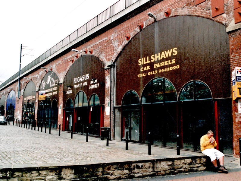 Commercial premises on Church Walk, off Kirkgate, under the railway lines. Sillshaws car panels can be seen at no2 Pegasus car hire at no 4 and Top G lass at No6. Pictured in September 1999.